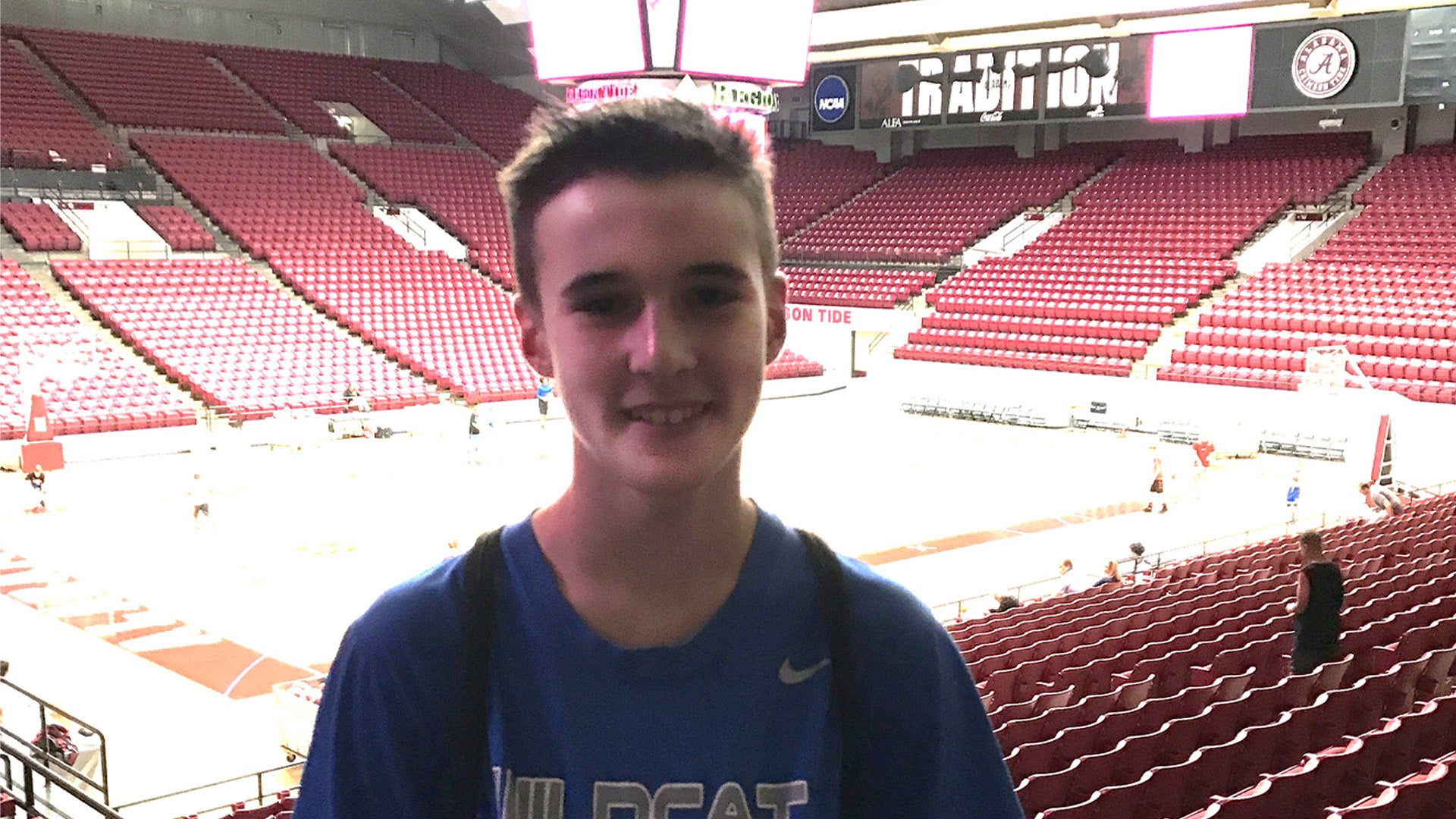 Riley in the stands of Coleman Coliseum