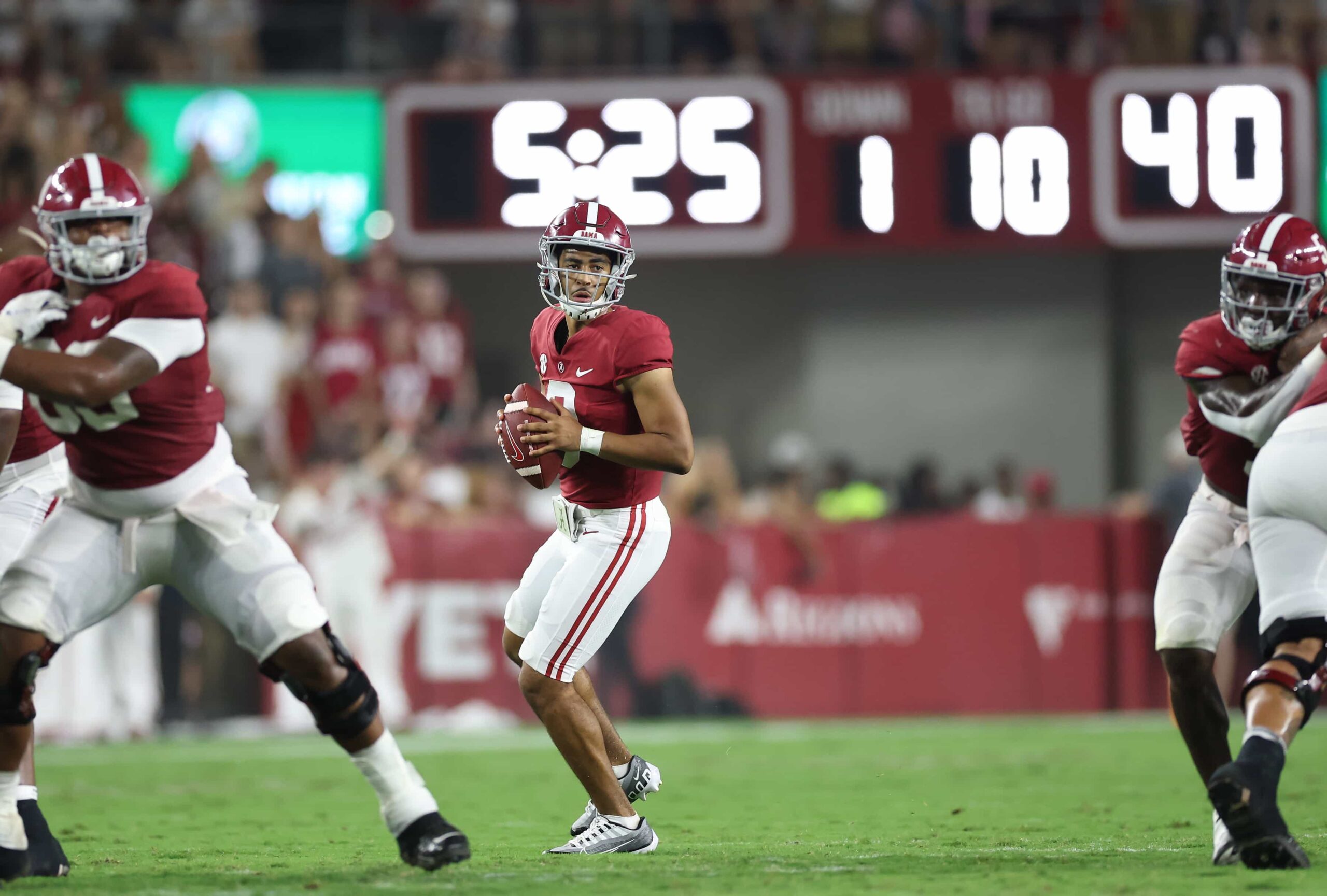 Alabama quarterback Bryce Young drops back to pass during a home game at Bryant-Denny Stadium, protected by his offensive line